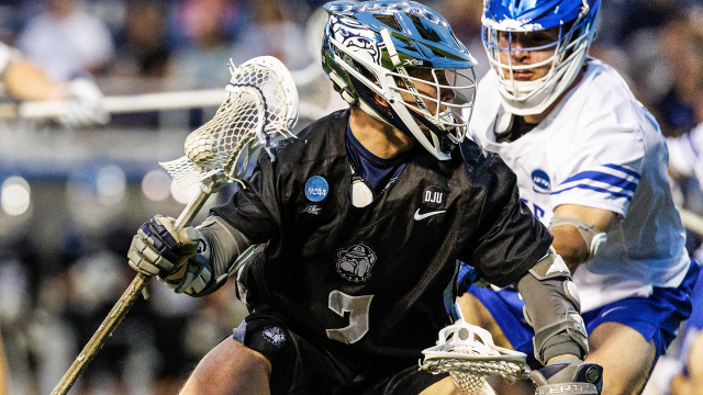 Georgetown's Fulton Bayman attacks the goal against a Duke defender.