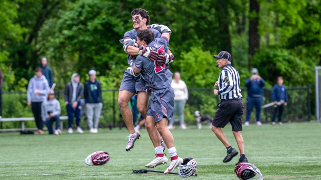Loomis Chaffee (Conn.) players celebrate after the final horn of an 8-7 win over Choate (Conn.) in the Founders League final.