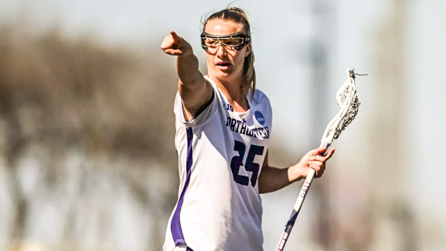 Northwestern women's lacrosse player Madison Taylor pointing toward the goal