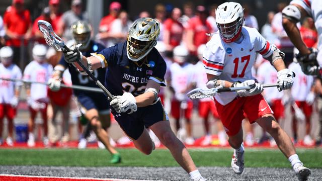 Will Lynch wins a faceoff for Notre Dame against Ohio State.