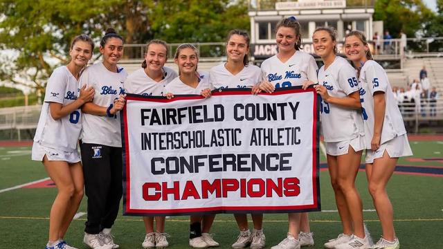Darien with its FCIAC championship banner
