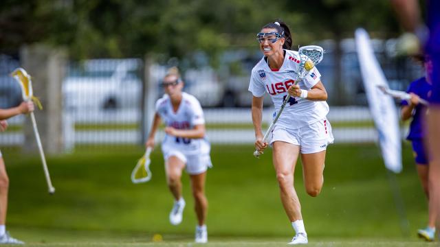 Marie McCool runs upfield with the ball against the Haudenosaunee during Sunday's PALA semfinal