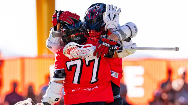 Jackson Eicher celebrates a goal with Owen Hiltz