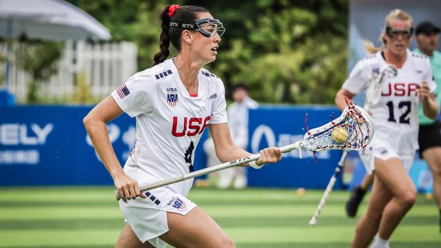 Marie McCool runs upfield with the ball against Japan in the semifinals at The World Games