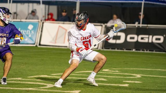 Jeff Teat carries the ball for Canada in the 2023 World Lacrosse Men's Championship
