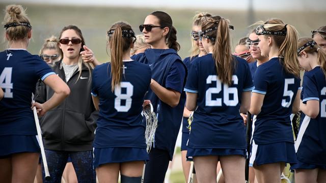 Sam Geiersbach gives instructions to her Valor Christian girls lacrosse team