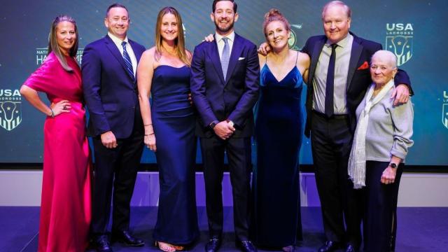 National Lacrosse Hall of Fame Class of 2025 inductees on stage during the induction ceremony Jan. 10 in Baltimore