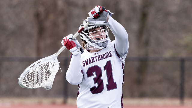 Swarthmore goalie Drew Tyson unleashes a clearing pass