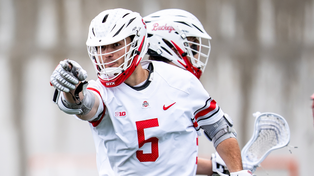 Ohio State attackman Alex Marinier points to teammate in celebration