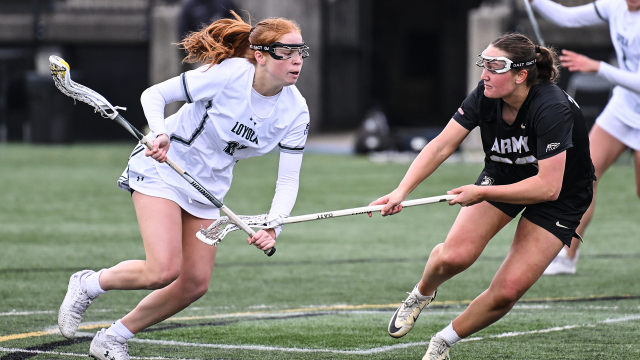 Loyola's Mim Suares-Jury dodges one-on-one against an Army defender