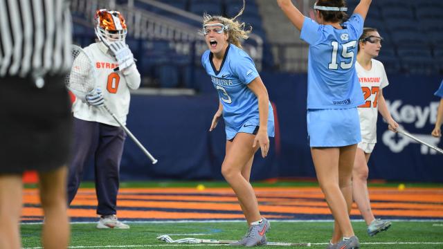 Kiley Mottice yells in celebration after a goal for North Carolina against Syracuse