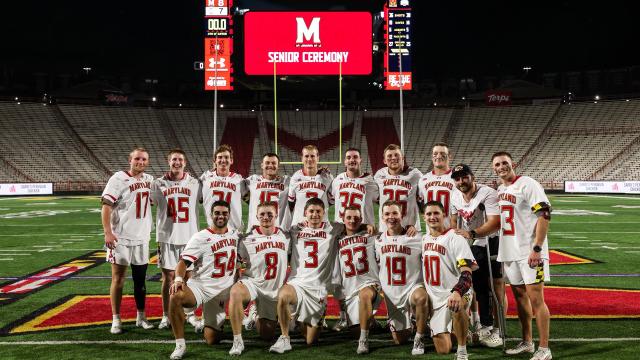 Maryland seniors in a group photo after beating Ohio State in overtime