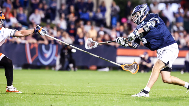 Georgetown lacrosse player Jake Bickel fires a shot on goal during the Hoyas' NCAA tournament first-round game at Virginia.