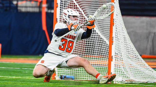 Syracuse goalie Jimmy McCool makes a save against Yale in an NCAA tournament game at the JMA Wireless Dome.