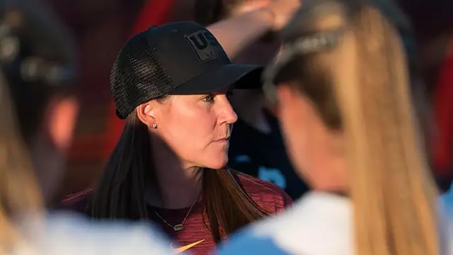 Lindsey Munday on the sideline with a black USC hat
