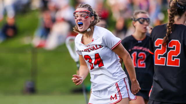 A Maryvale girls' lacrosse player roars in celebration after scoring in the IAAM A Conference championship game at USA Lacrosse in Sparks, Md.
