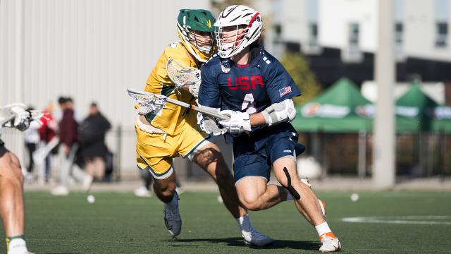 Pat Kavanagh runs with the ball in a game against Australia last fall