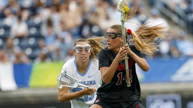 Stanford's Amanda Lawson is guarded by a North Carolina defender during the ACC championship game.