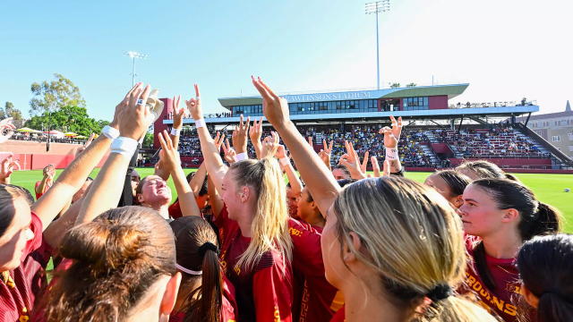 USC women's lacrosse team huddle at Rawlinson Stadium