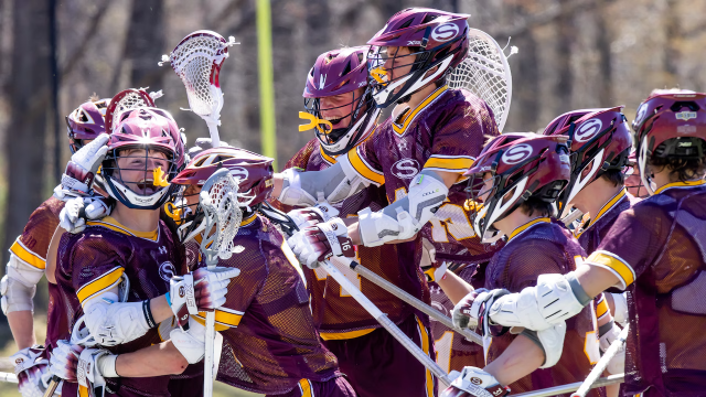 Summit (N.J.) boys' lacrosse players celebrate after a victory earlier this season