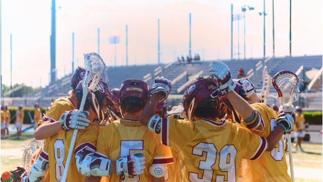Summit boys' lacrosse huddle