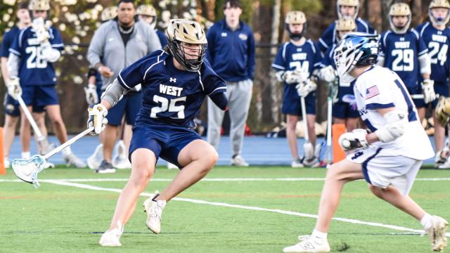 West Forsyth (Ga.) sophomore attackman Alex Pain cradling with his right arm in a game four years after losing his left arm in an ATV accident.