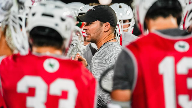 Coach James Purpura in the Ohio State lacrosse huddle