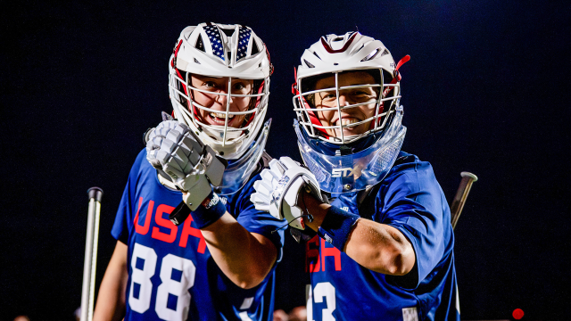 Goalies Shea Dolce (88) and Caylee Waters raise gloved fists toward camera during U.S. Women's National Team training camp in Dallas in January 2026.