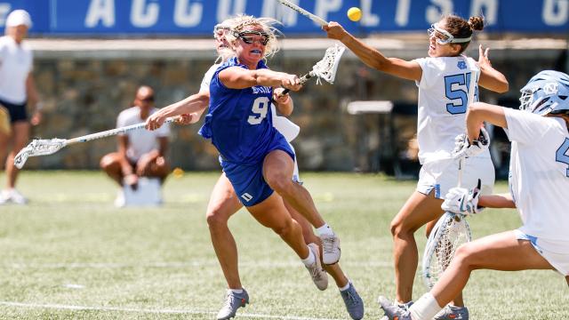 Duke's Quinn Whitaker shoots on North Carolina goalie during the ACC women's lacrosse quarterfinals in Charlotte.
