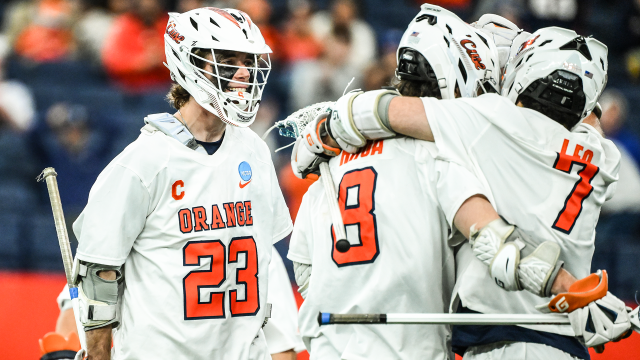 Finn Thomson (23), Luke Rhoa (8) and Michael Leo (7) celebrate a goal at JMA Wireless Dome during Syracuse's NCAA tournament first-round game against Yale.