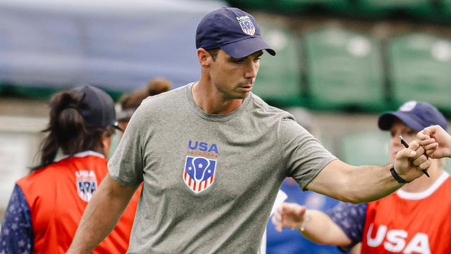 Tim McCormack fist bumps a USA player during the 2024 Women's U20 World Championship