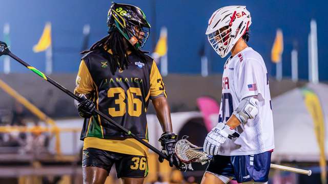 USA attackman Brian Kelly and Jamaica defenseman Tony Diallo during Pan-American Men's Lacrosse Championship pool play