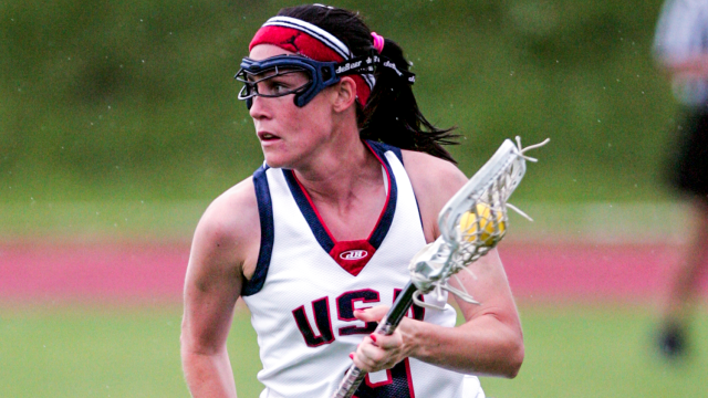 Lindsey Munday carries the ball for the U.S. Women's National Team in the 2009 World Lacrosse Women's Championship final against Australia.