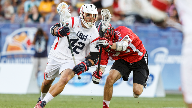 USA midfielder Max Seibald dodges a Canadian defender during the 2014 World Lacrosse Men's Championship in Denver.