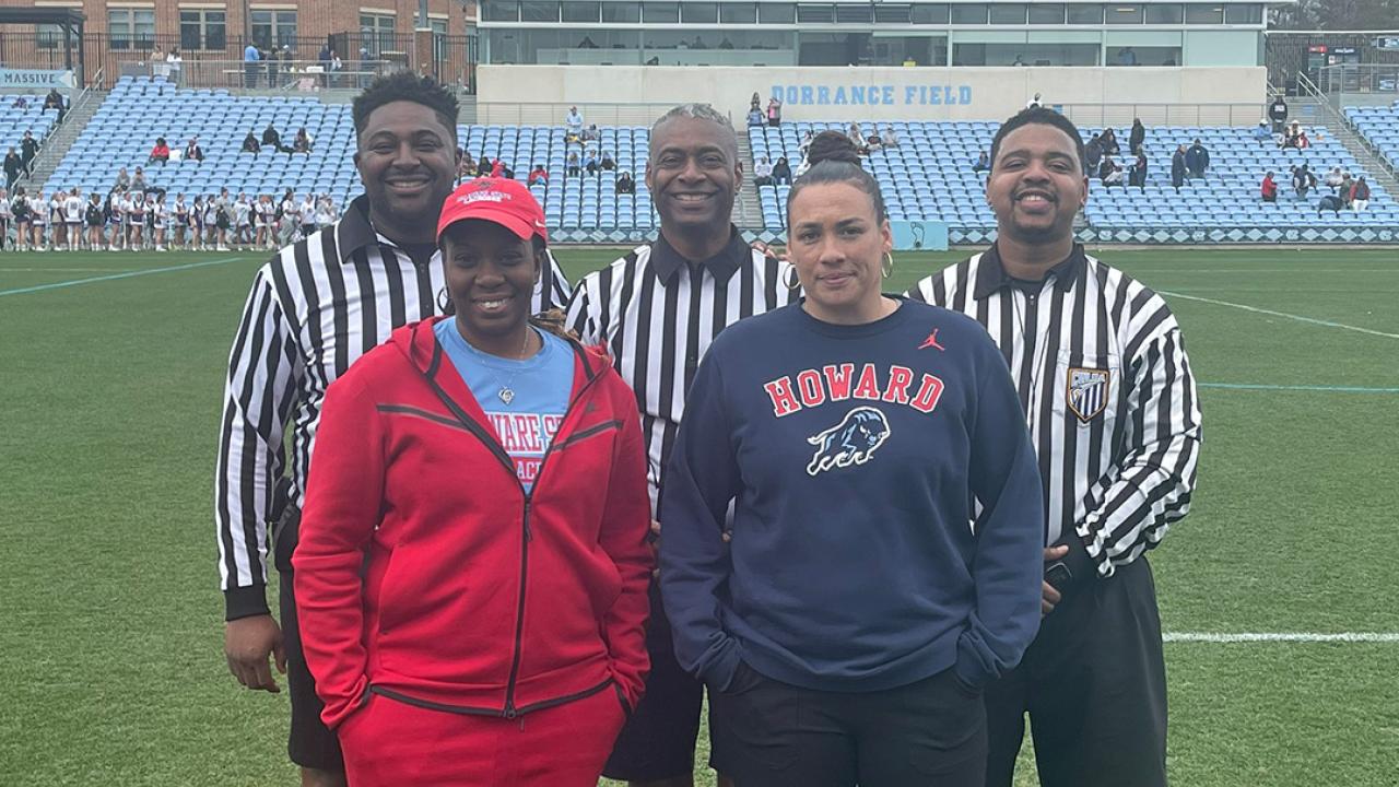Delaware State and Howard coaches with officials