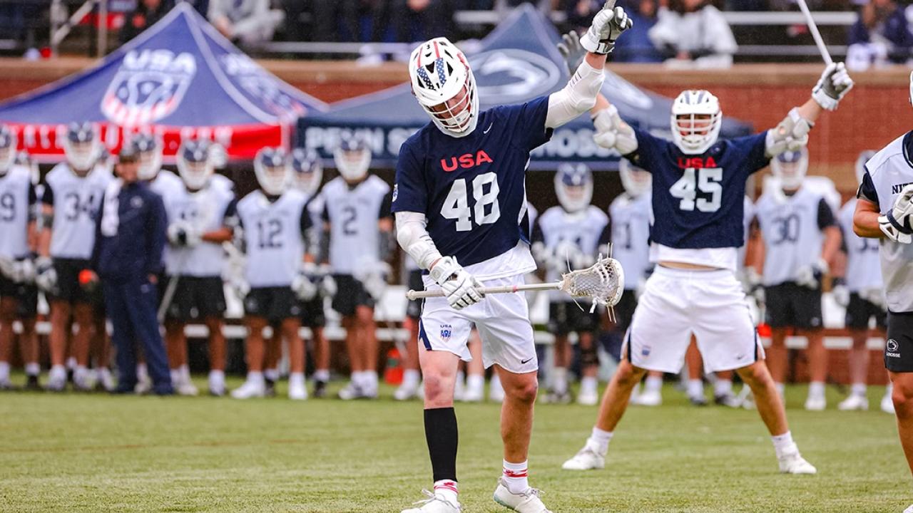 Mac O'Keefe celebrates one of his five goals against his alma mater in a 16-9 victory for the U.S. men over Penn State.