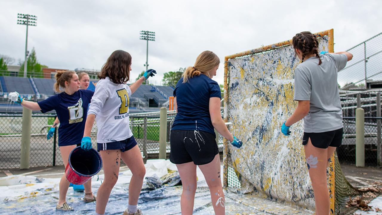 Players from Decatur (Ga.) High School create abstract expressionist art through lacrosse.