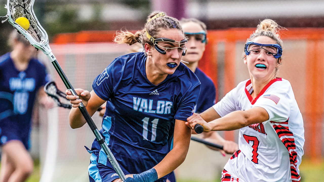 Valor Christian (Colo.) girls' lacrosse player Eliza Osburn in action against Colorado Academy (Colo.)