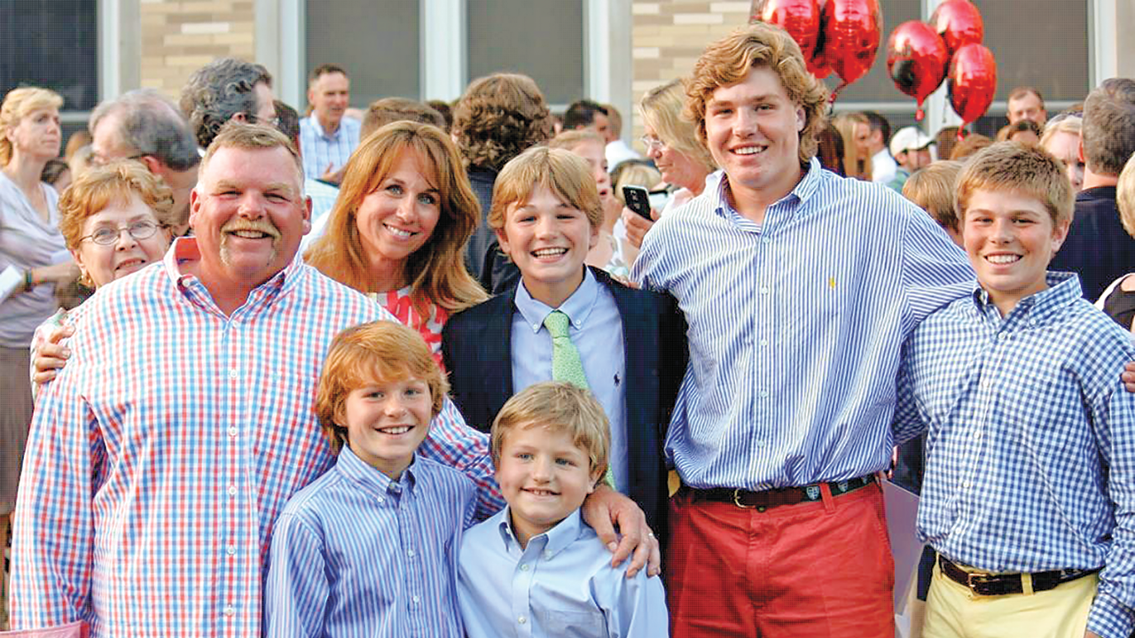 From left, Kyle and Michelle Kirst and their five lacrosse-loving sons, CJ, Caden, Cole, Colin and Connor.