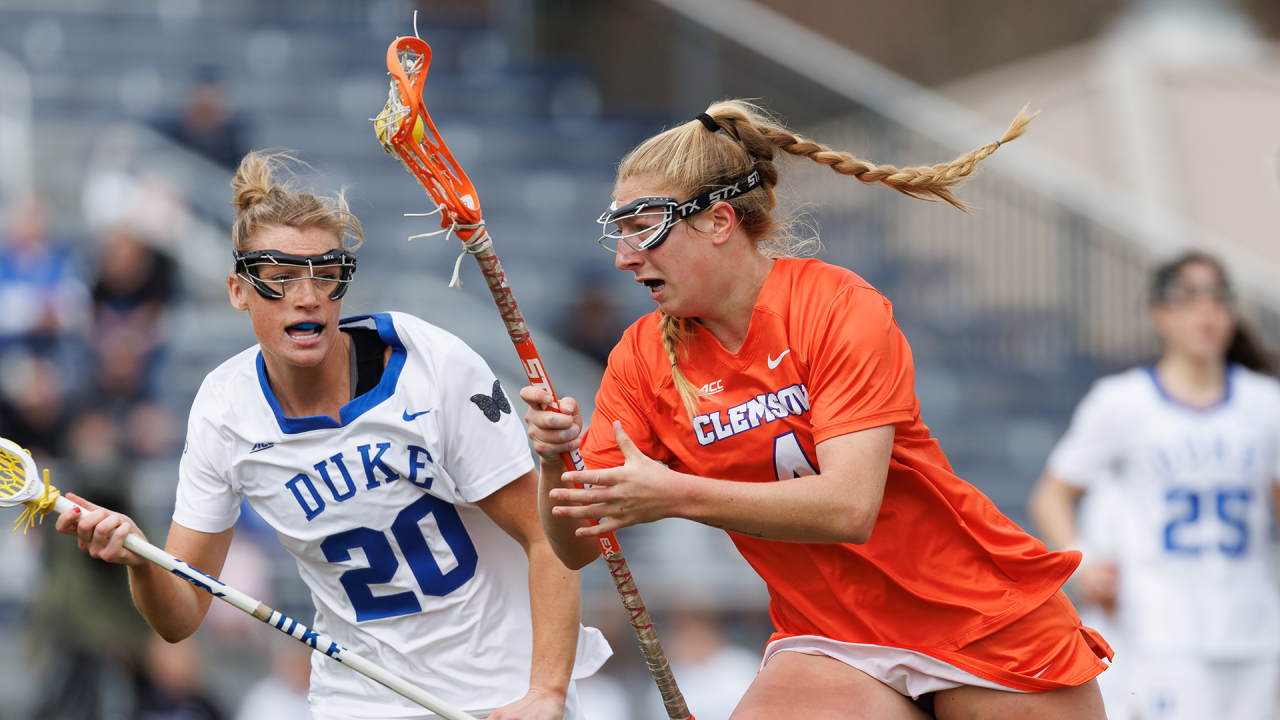 Clemson's Paris Masaracchia runs with the ball up the field against Duke.