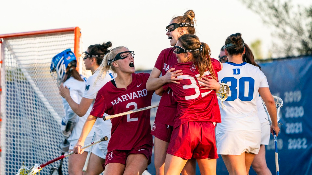 Harvard players celebrate a goal.