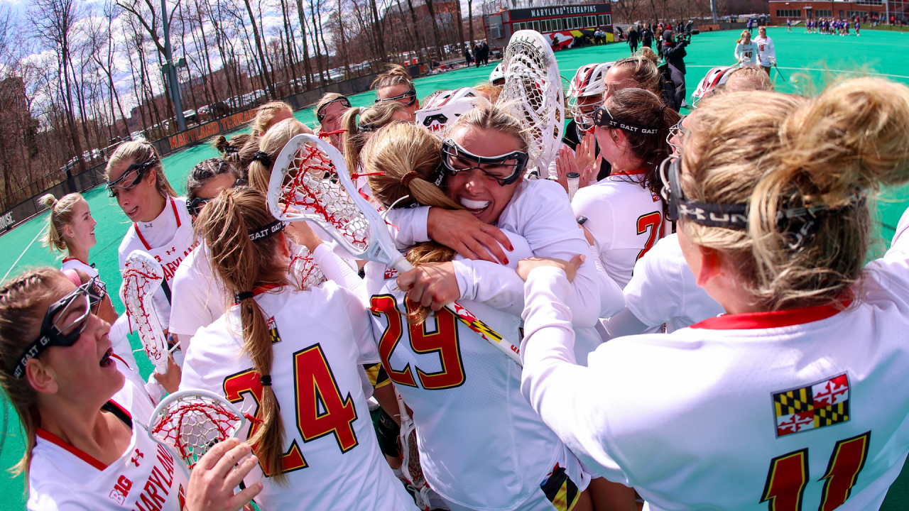 Maryland women's lacrosse celebrates its win over James Madison.