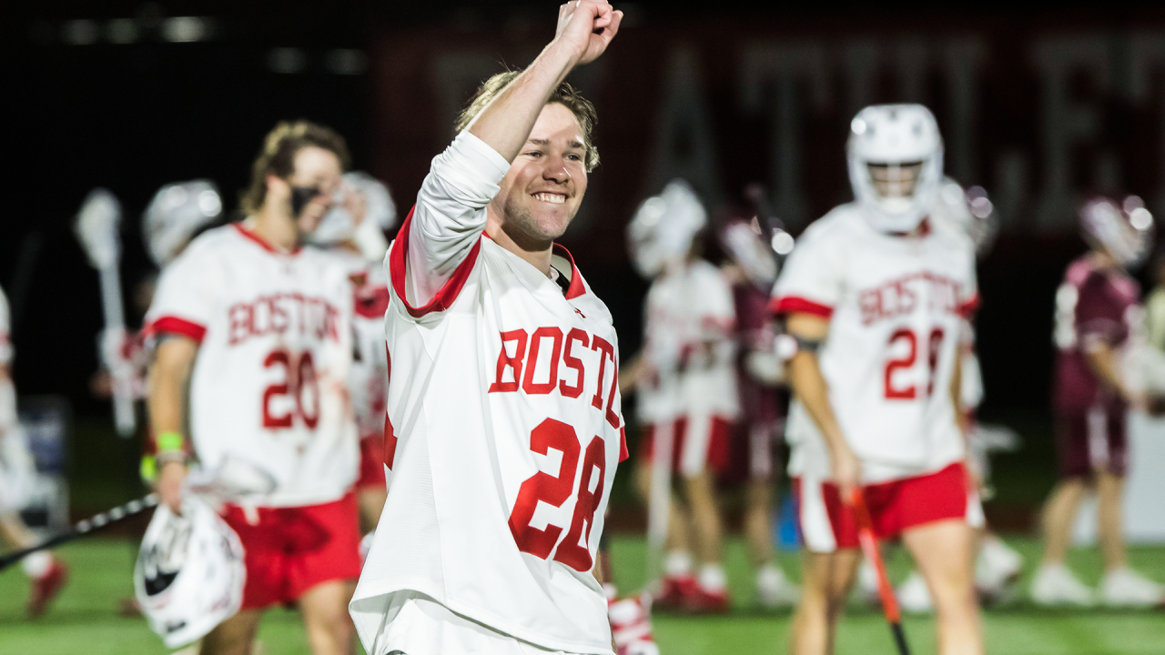 Boston University goalie Will Barnes celebrates after the Terriers' triple-overtime triumph