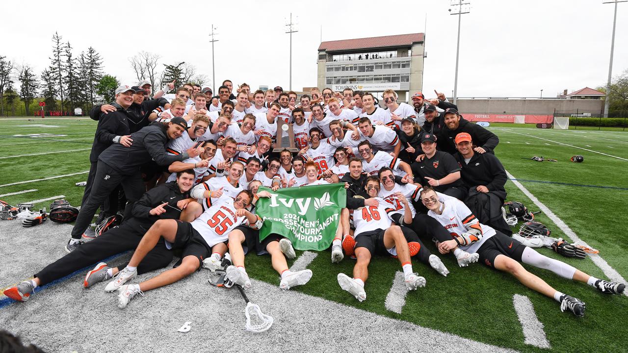 Princeton team photo with 2024 Ivy League Men's Lacrosse Tournament Champion banner