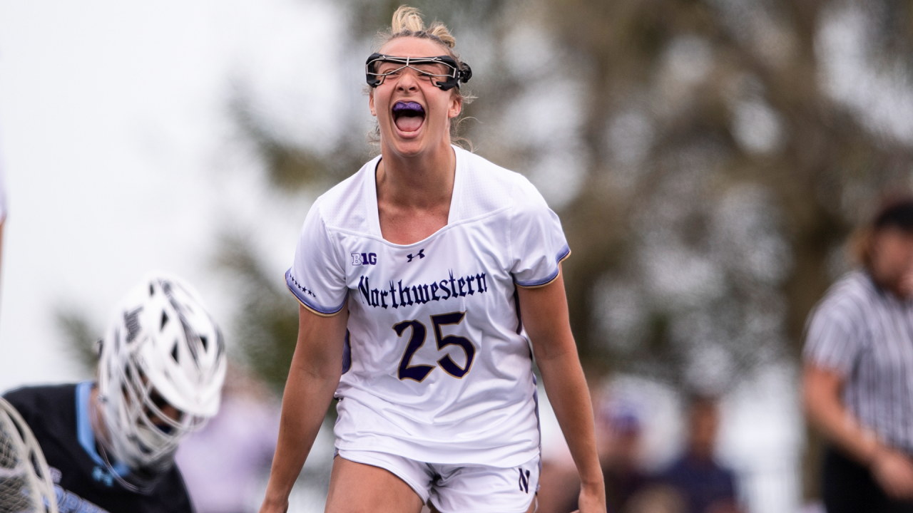 Northwestern's Madison Taylor celebrates after scoring against Johns Hopkins