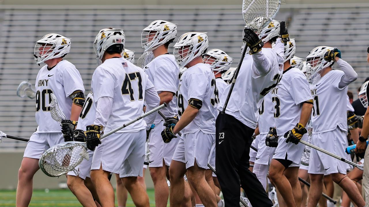 Army sideline celebrates during men's lacrosse game against North Carolina