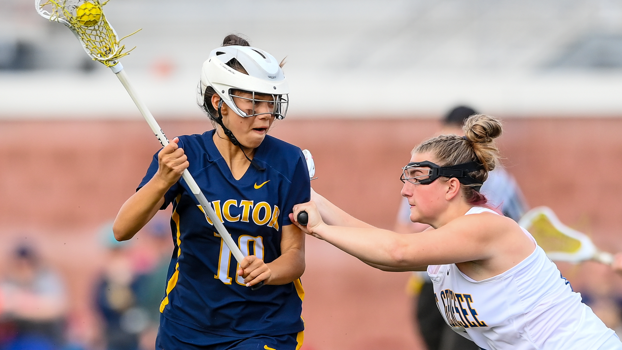 Camryn Adrid of Victor (N.Y.) girls' lacrosse in action in the 2024 state championship game in Cortland, N.Y.