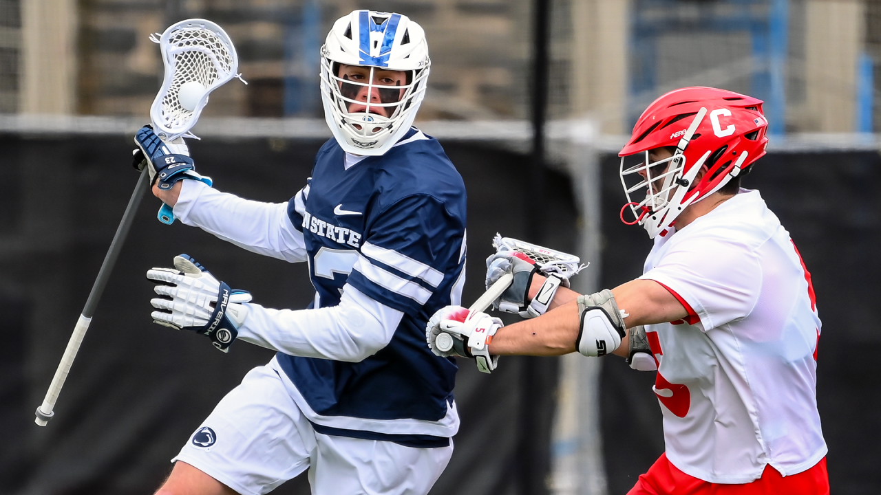 Penn State's Hunter Aquino dodges a Cornell defender during a game March 8 in Ithaca, N.Y.