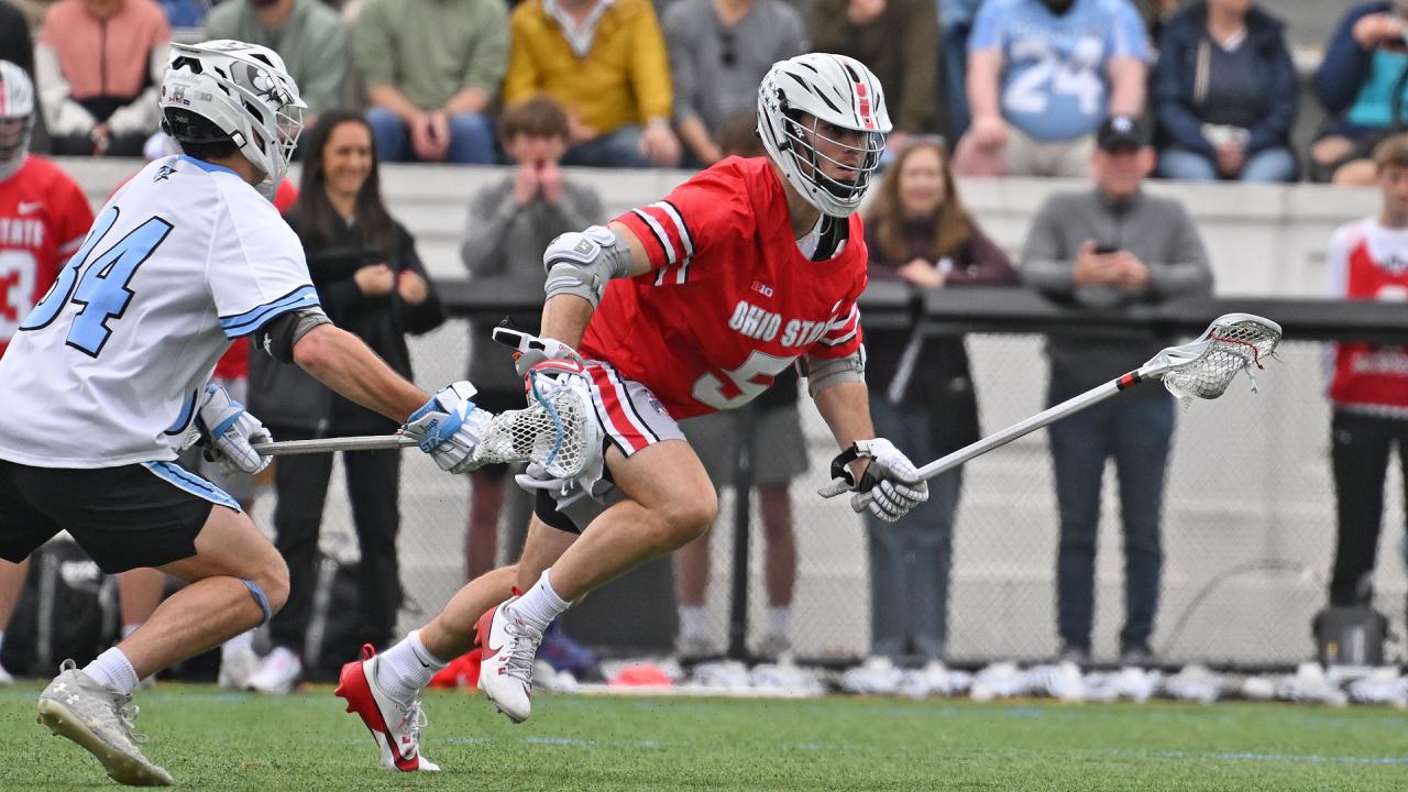 Ohio State's Alex Marinier runs with the ball against Johns Hopkins.