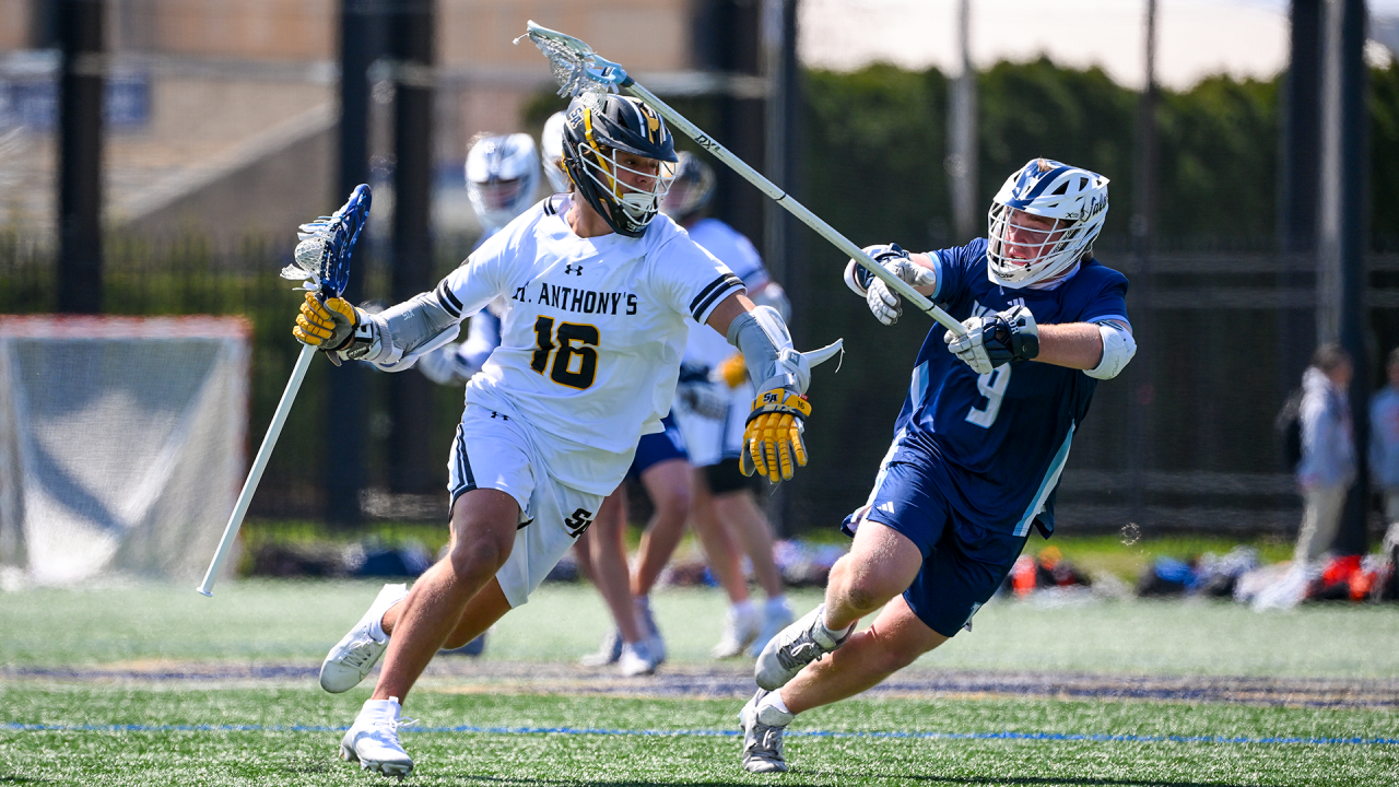 St. Anthony's (N.Y.) midfielder Gary Merrill goes against a Valor Christian (Colo.) defender in a neutral-site game at Notre Dame's Arlotta Stadium.